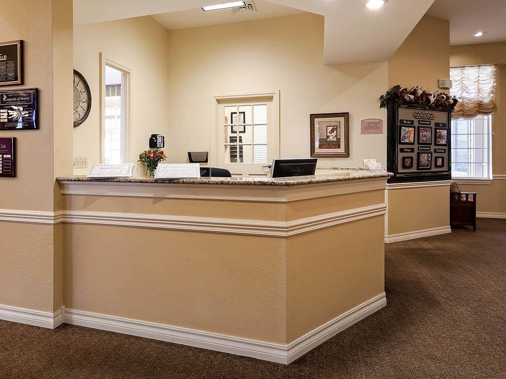 A welcoming reception desk in an office lobby.