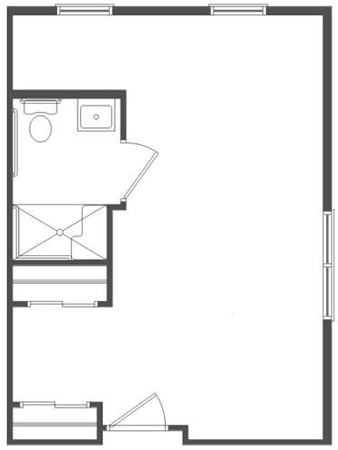 A floor plan depicting a bathroom layout with a toilet, sink, and shower area.