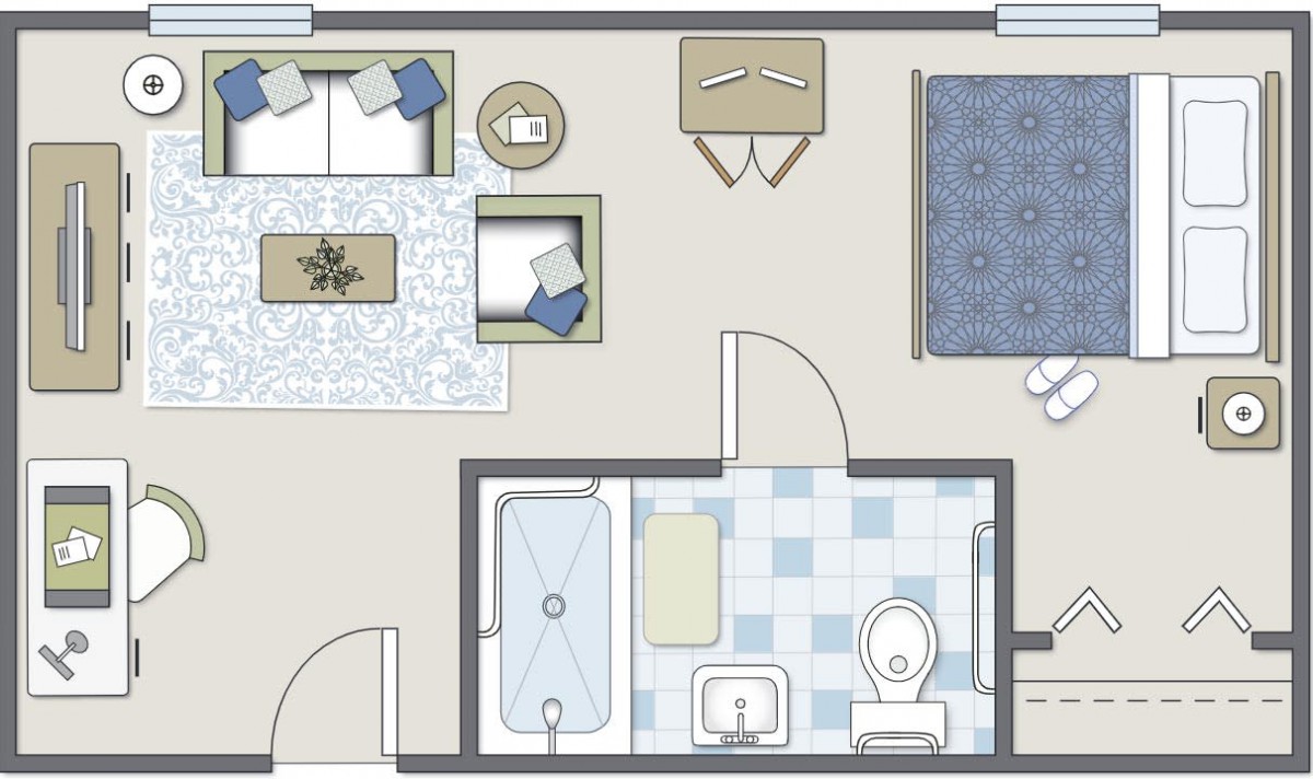 A detailed floor plan of a small apartment featuring a living room, bedroom, and bathroom.