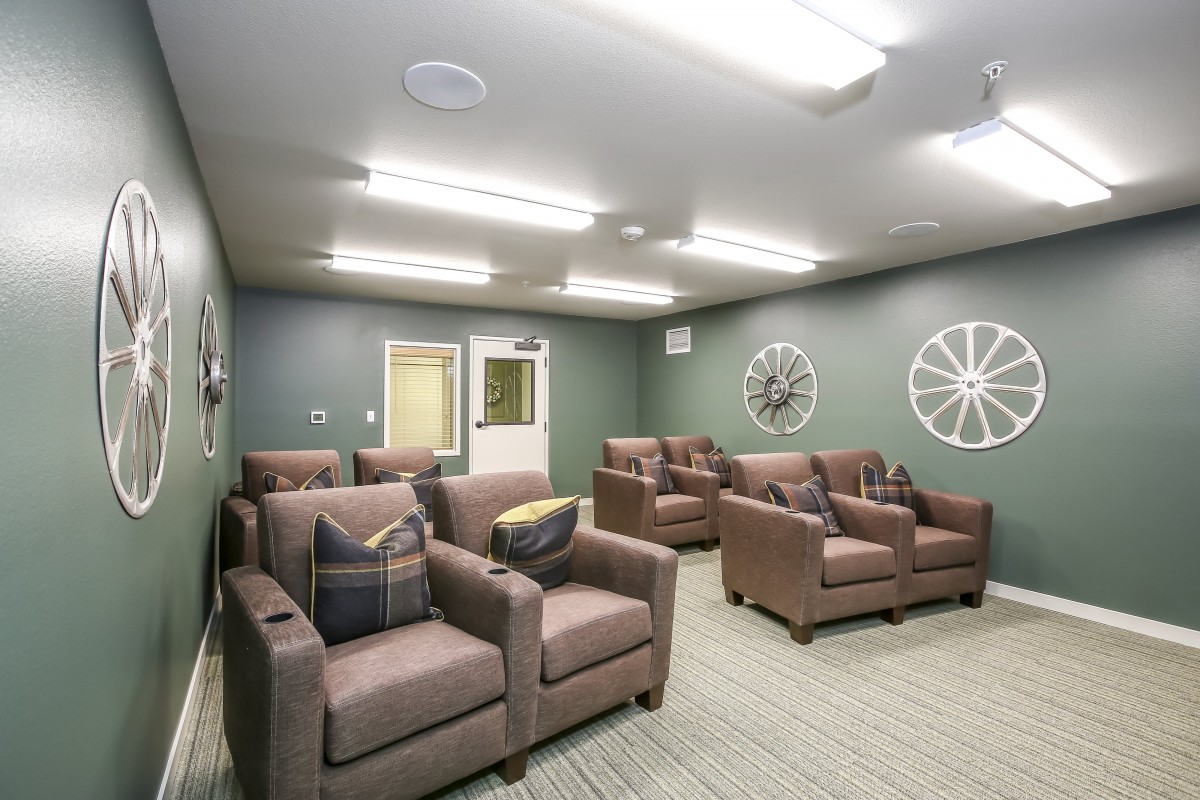 A modern lounge area with multiple comfortable chairs arranged for relaxation.