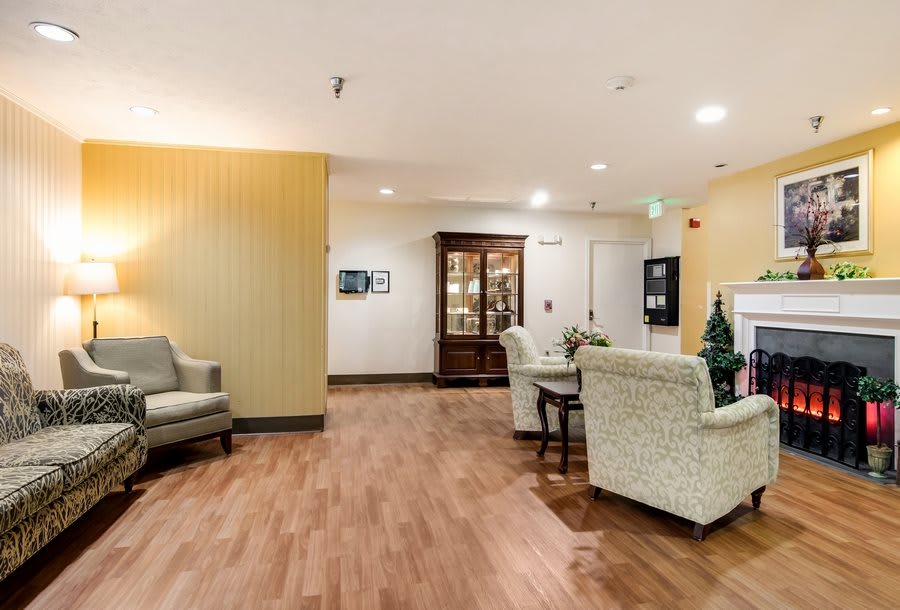 A cozy lobby area with comfortable seating and modern decor.