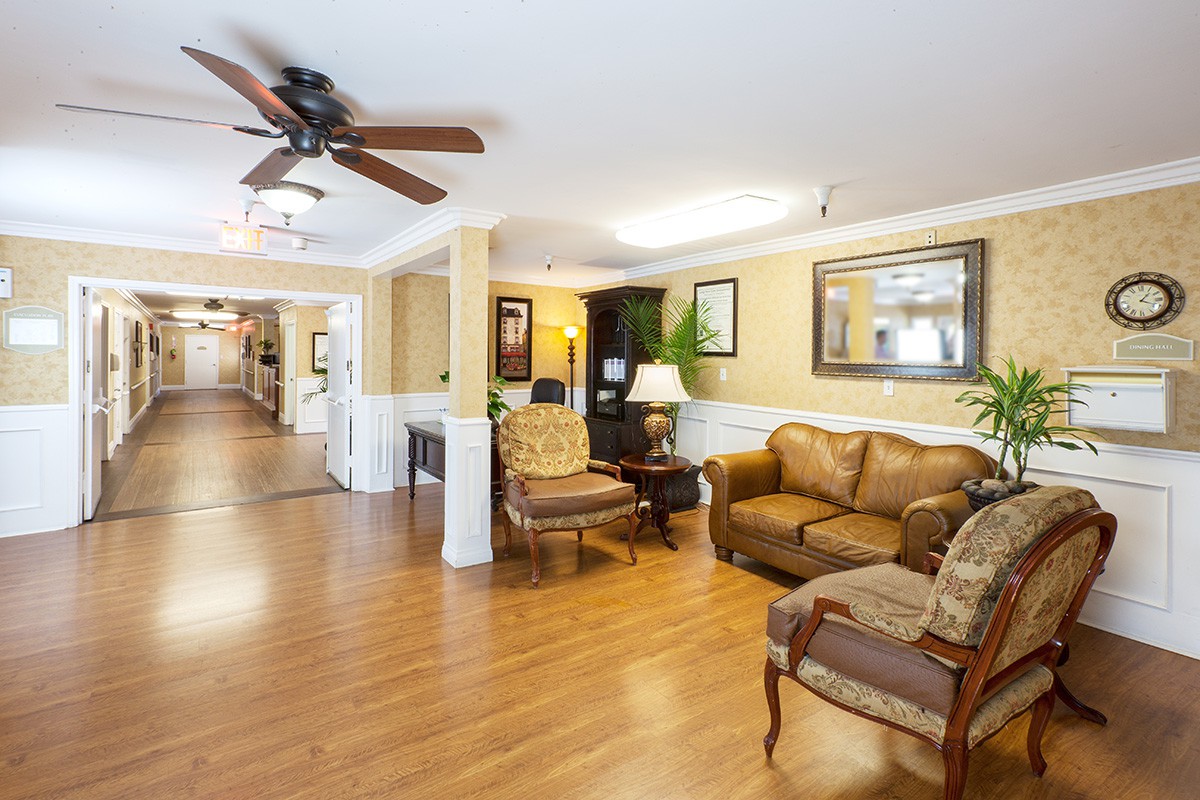 A cozy living room with comfortable seating and elegant decor.