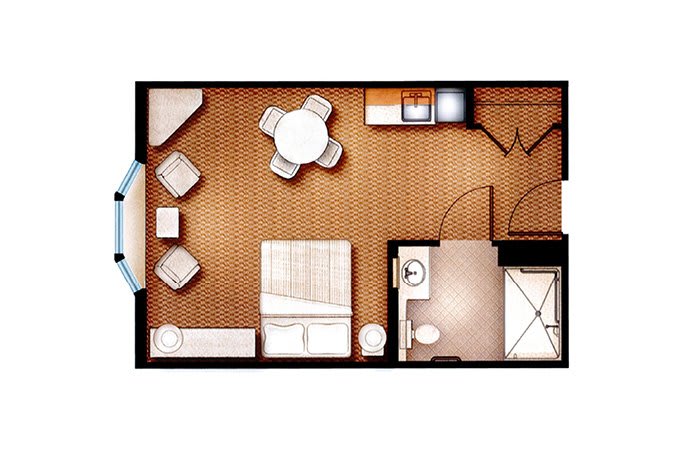 A floor plan of a compact studio apartment featuring a bed, dining area, small kitchen, and bathroom.