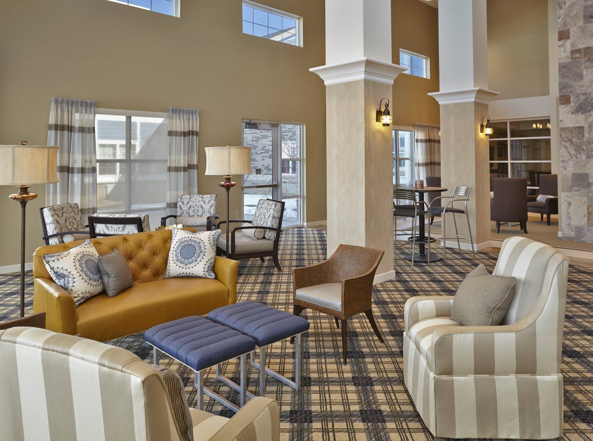 A modern and cozy lobby with comfortable seating arrangements.