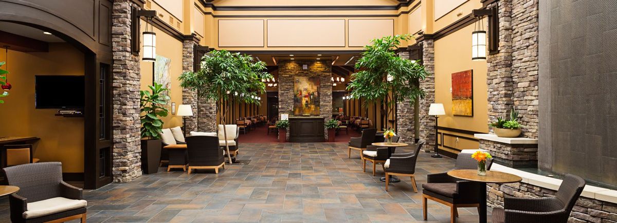 A luxurious lobby area with comfortable seating and elegant decor.