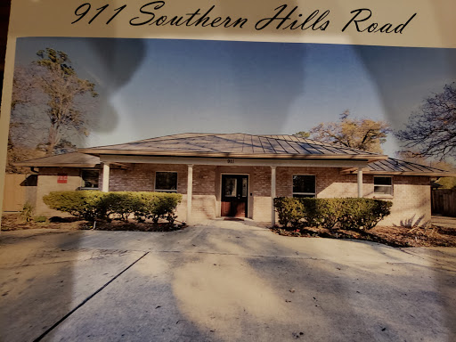 A charming residential building located at 911 Southern Hills Road.