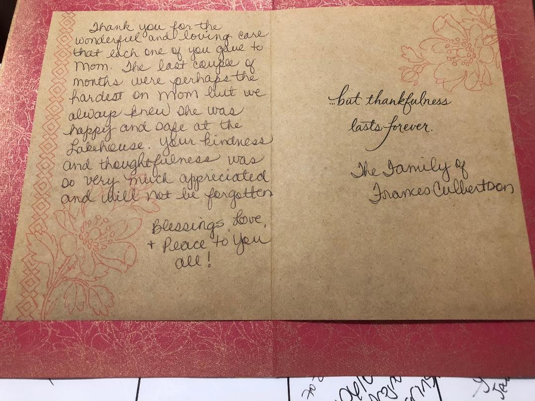 A thank you card with a handwritten message expressing gratitude.