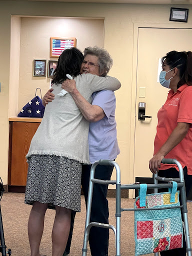 A heartfelt embrace between two individuals, highlighting the importance of emotional support and connection.