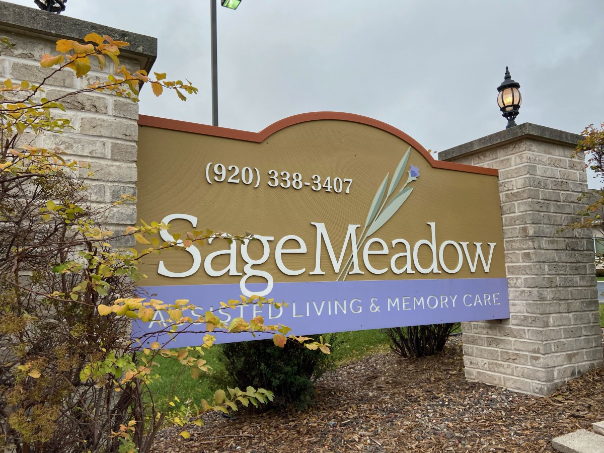 Sign for Sage Meadow, an assisted living and memory care facility.