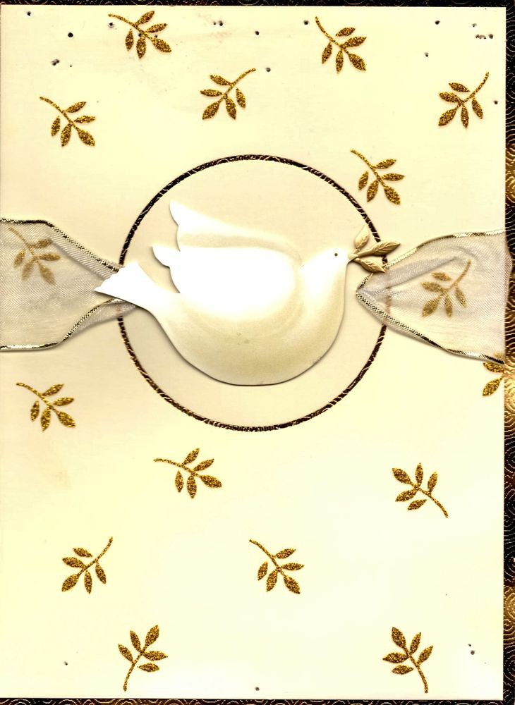 A decorative design featuring a dove with gold accents and ribbon, symbolizing peace.