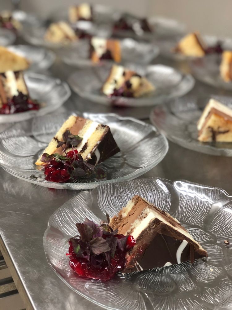 Plated slices of cake with garnish.