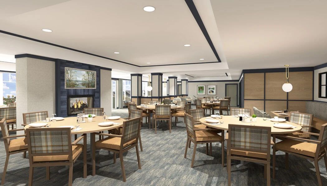 A modern restaurant dining area with neatly arranged tables and chairs.