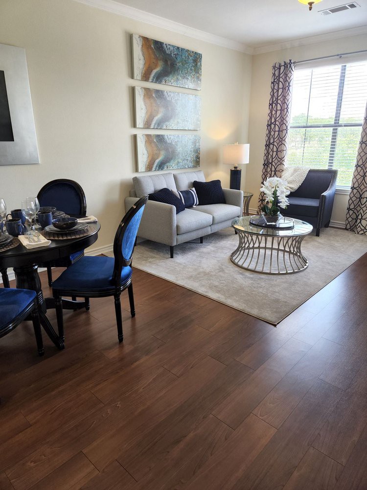 A stylish living room with modern furniture and tasteful decor.