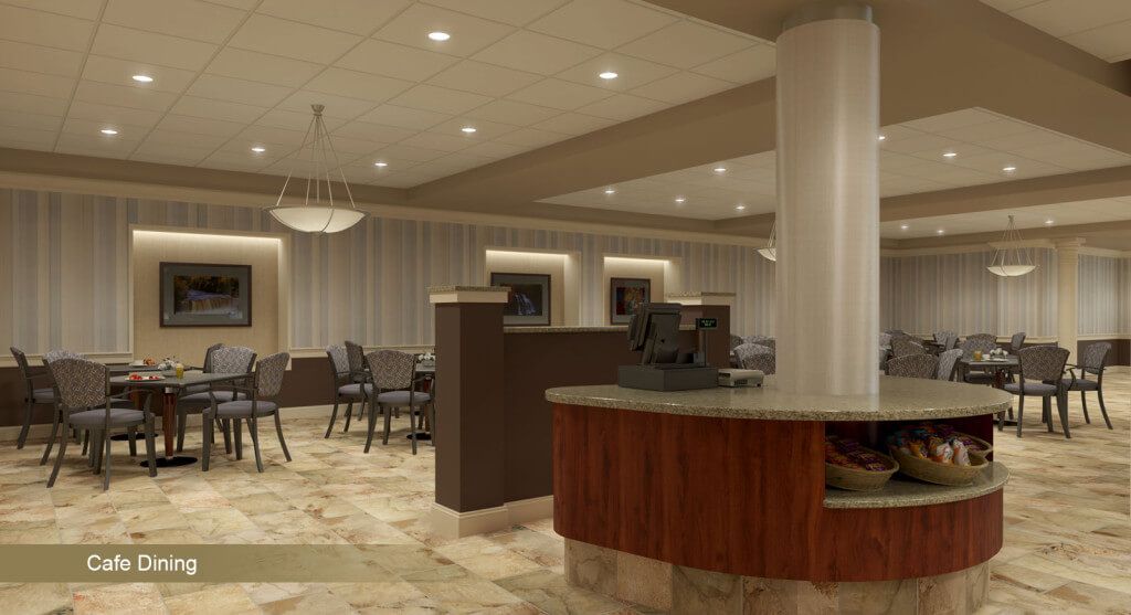 A modern lobby with a reception desk and seating area.