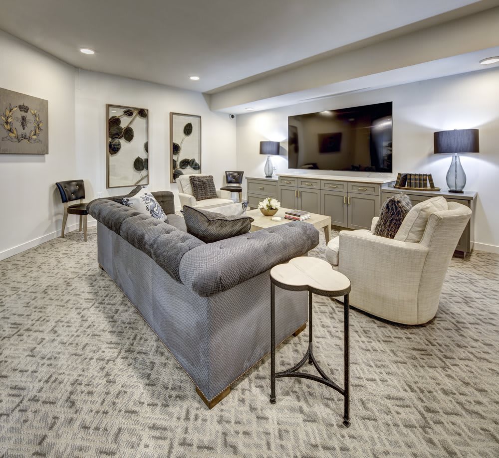 A modern living room with sleek furniture and stylish decor.