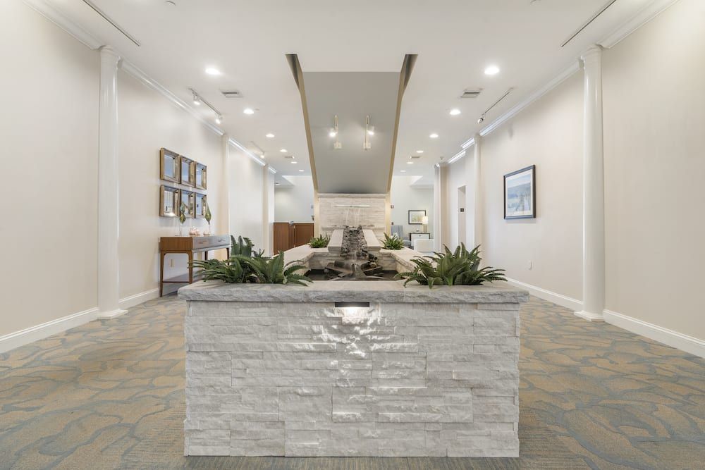 A modern reception area with sleek design elements and neutral colors.