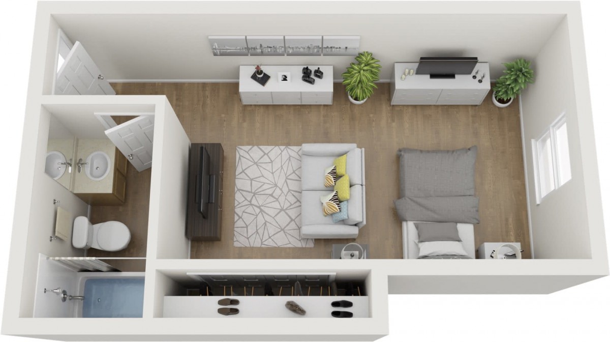 Aerial view of a modern apartment layout featuring a living area and bedroom.