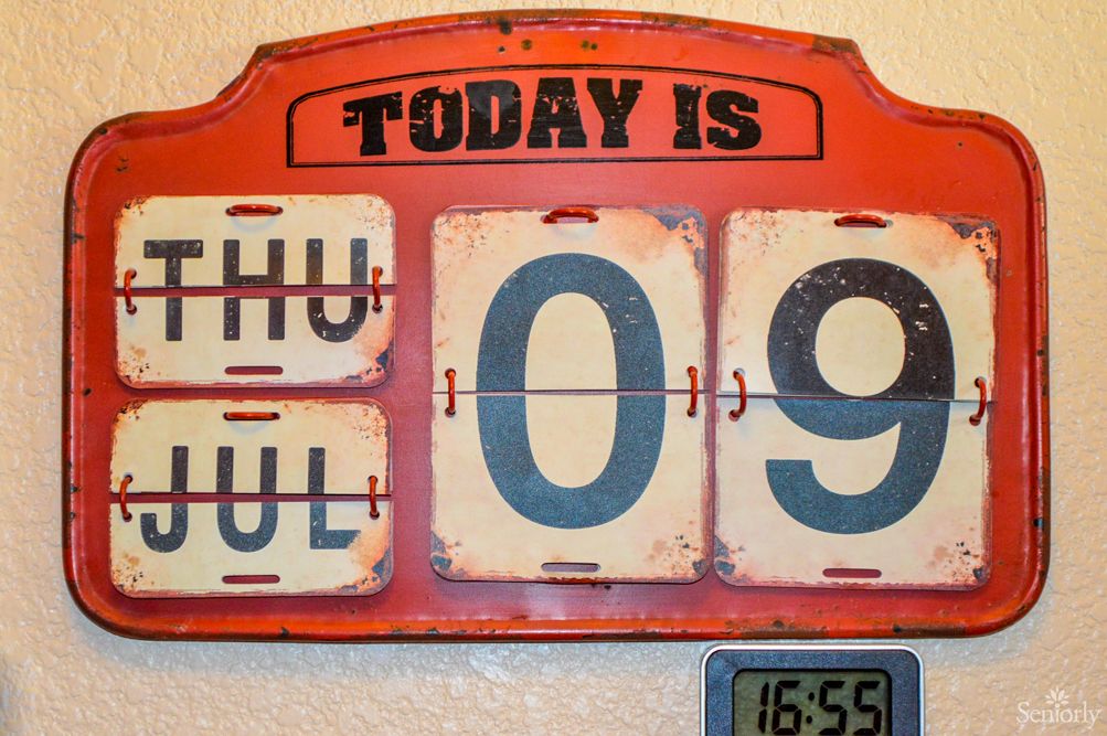 A vintage calendar displays the date as Thursday, July 9.