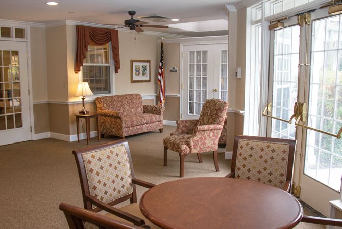 A cozy living room with comfortable seating and natural light.