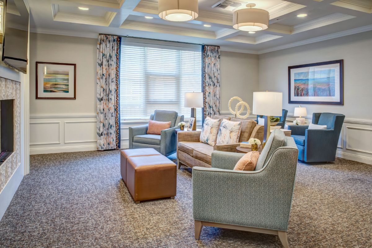 A cozy living room with comfortable seating and elegant decor.