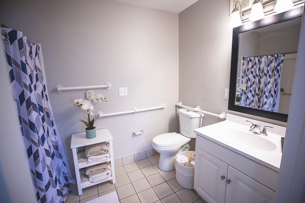 A clean and neatly organized bathroom with a modern design.