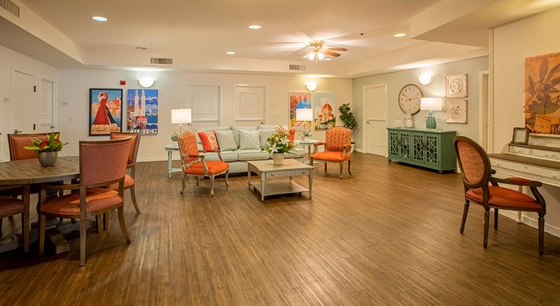 A cozy and modern living room with stylish furniture and warm lighting.