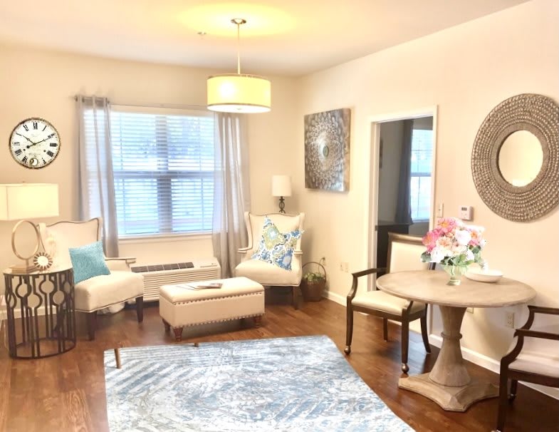 A cozy living room with stylish decor and comfortable seating.