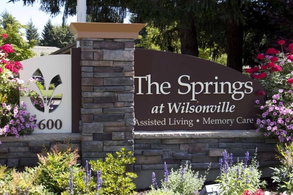 Entrance sign for The Springs at Wilsonville, featuring assisted living and memory care services.