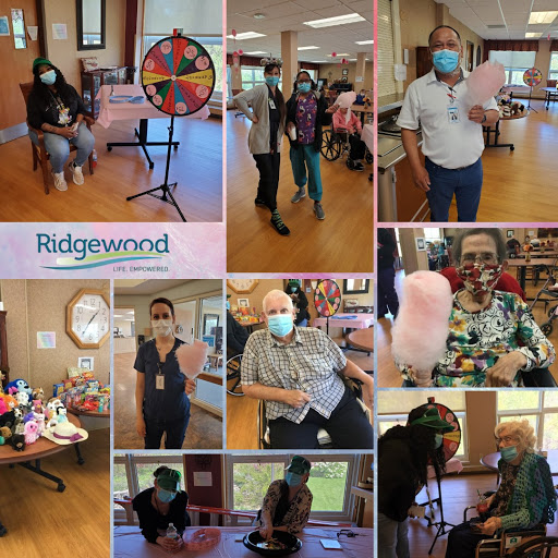 A lively gathering at Ridgewood featuring a variety of fun activities and social interactions for seniors.