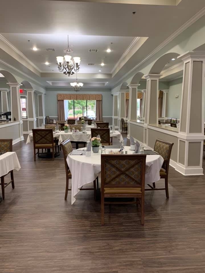 An elegant dining room with beautifully set tables and stylish decor.