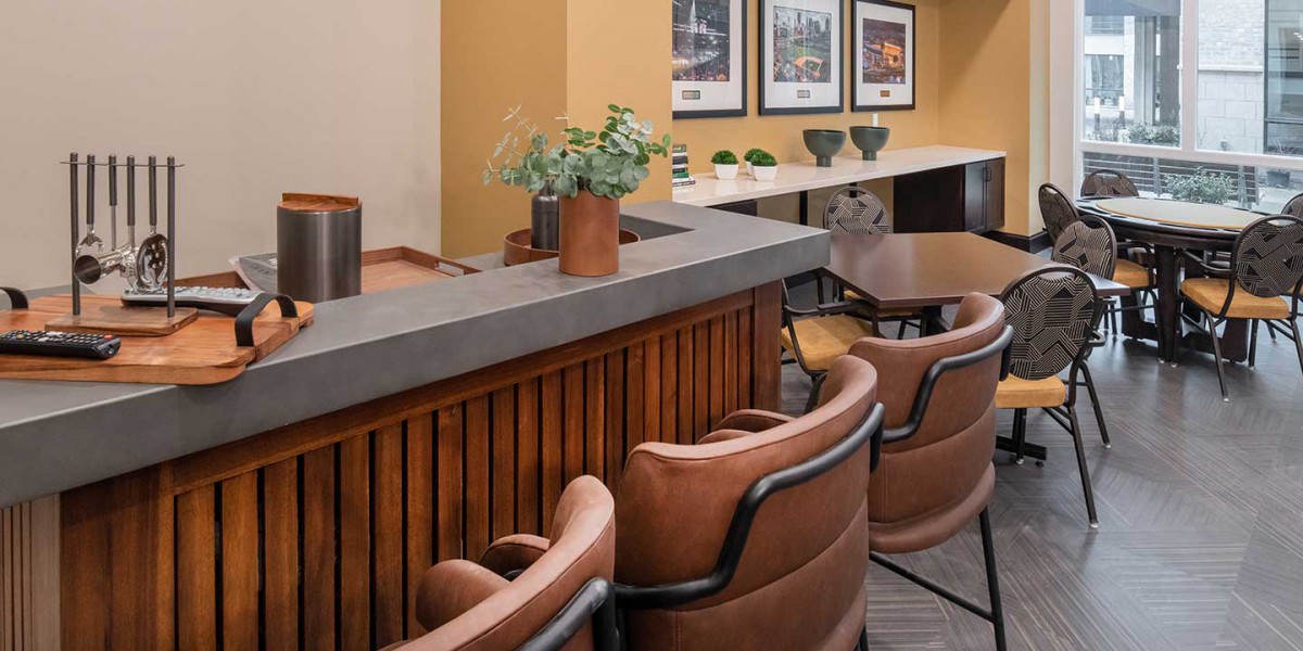 A modern bar area with stylish seating and decor.