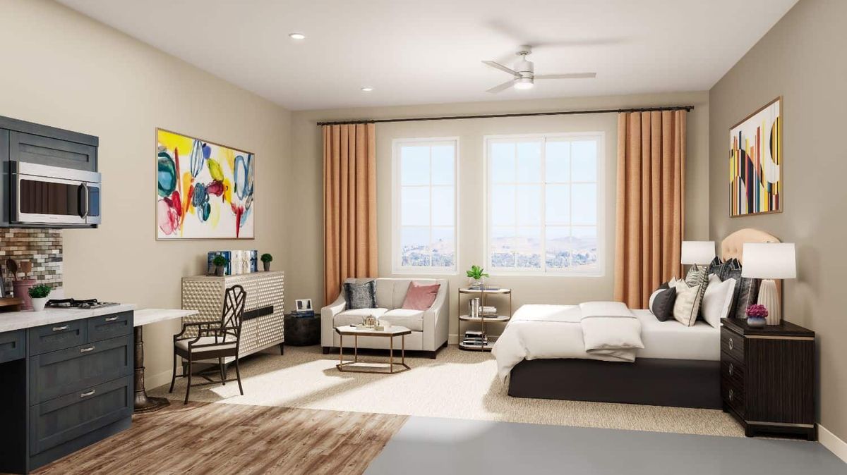 A modern and stylish bedroom with contemporary furniture and colorful artwork.