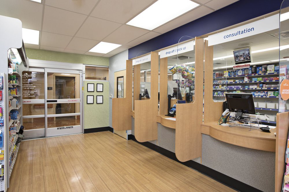 A modern reception area with multiple service counters and a clean, welcoming interior.