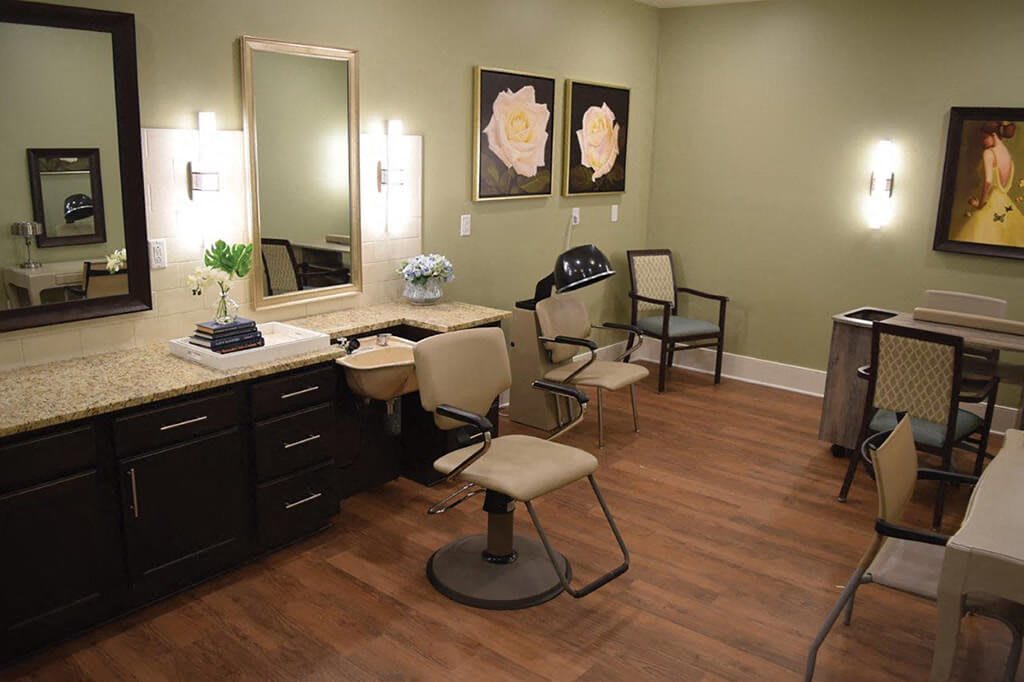 A well-equipped beauty salon featuring stylish chairs, mirrors, and modern decor.