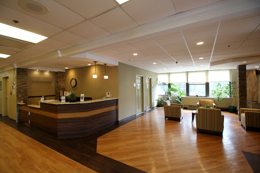 A modern and welcoming reception area with comfortable seating and abundant natural light.