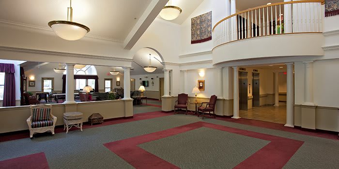 Spacious lobby area with elegant decor and comfortable seating.