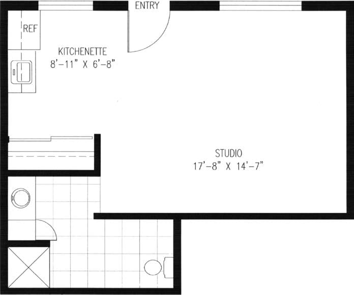 A floor plan of a studio apartment featuring a kitchenette and bathroom.