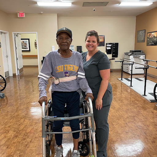 A heartwarming moment of support and progress during rehabilitation.