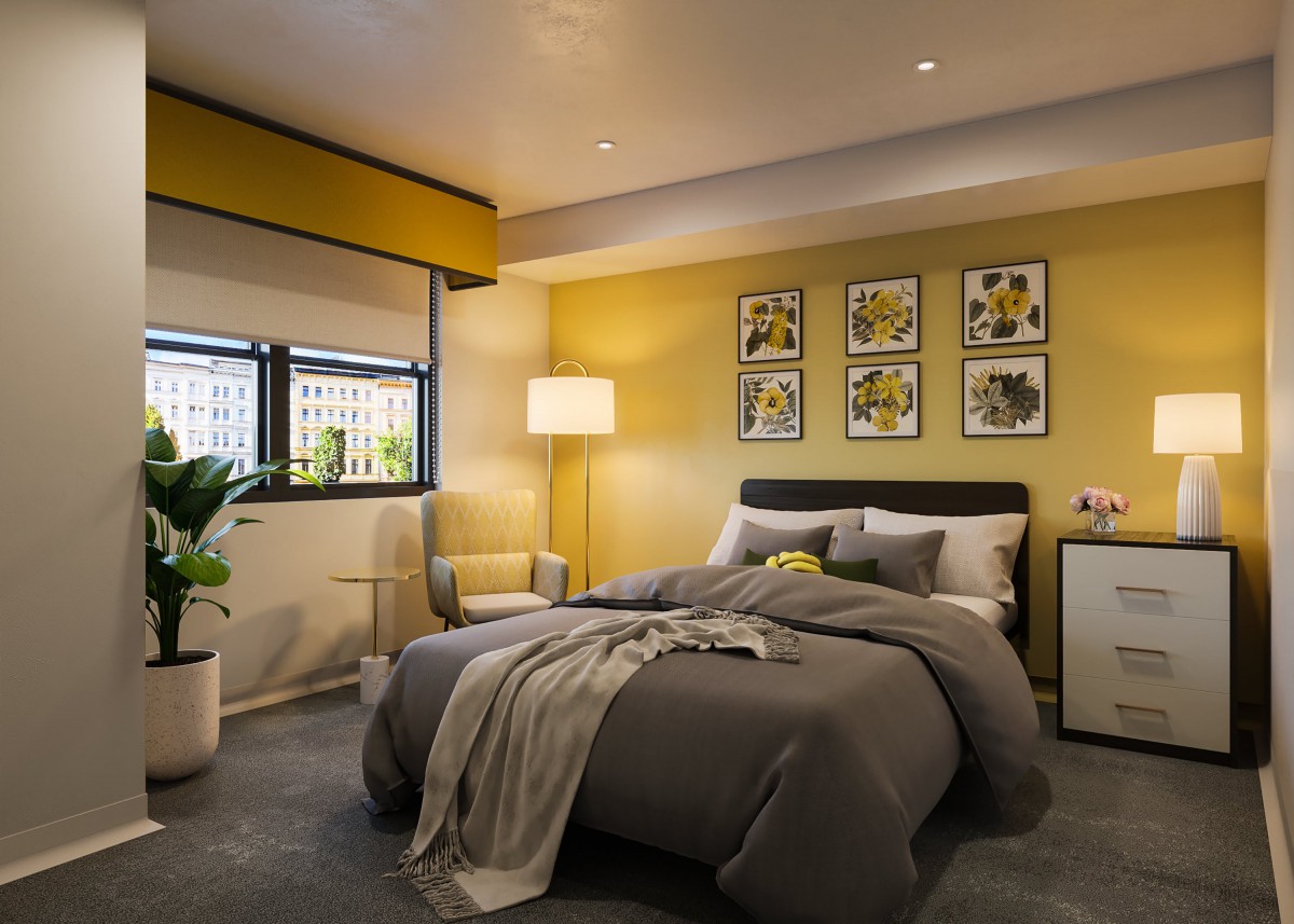 A cozy modern bedroom with yellow walls and stylish decor.