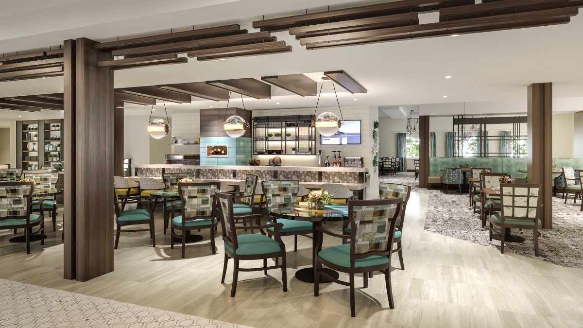 A modern restaurant interior featuring a well-designed dining area with stylish furniture and lighting.
