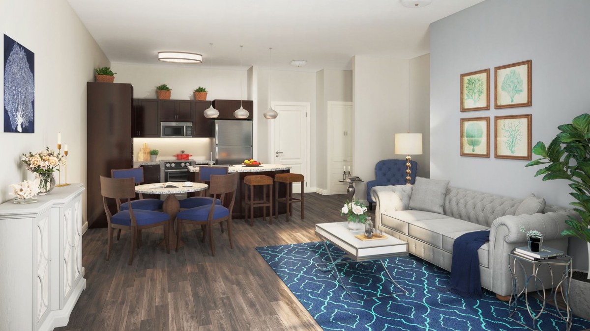 A modern open-concept living area with a kitchen, dining space, and cozy seating featuring blue accents.