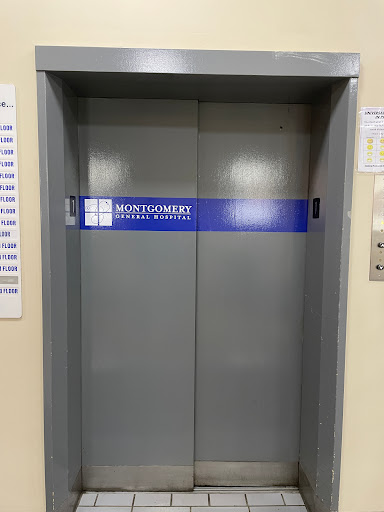 An elevator door in a building.