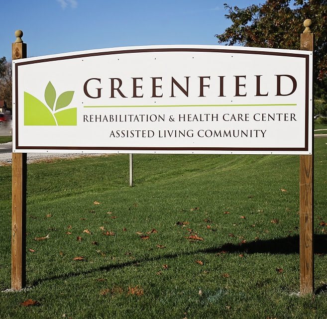 Sign for Greenfield Rehabilitation & Health Care Center and Assisted Living Community.