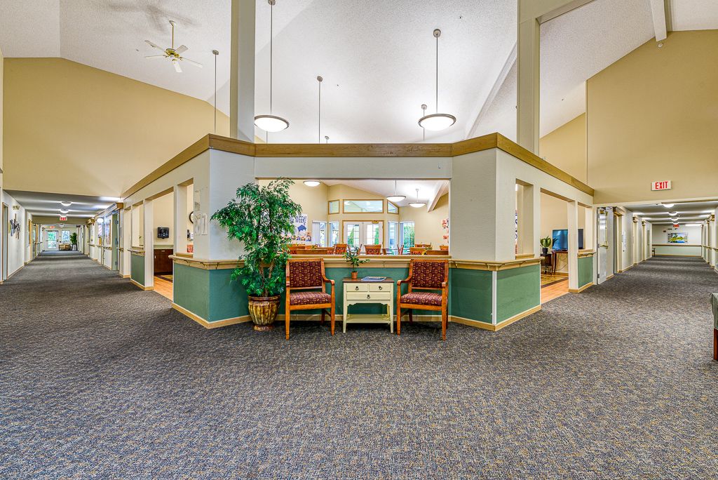 A spacious lobby area with seating and decor.