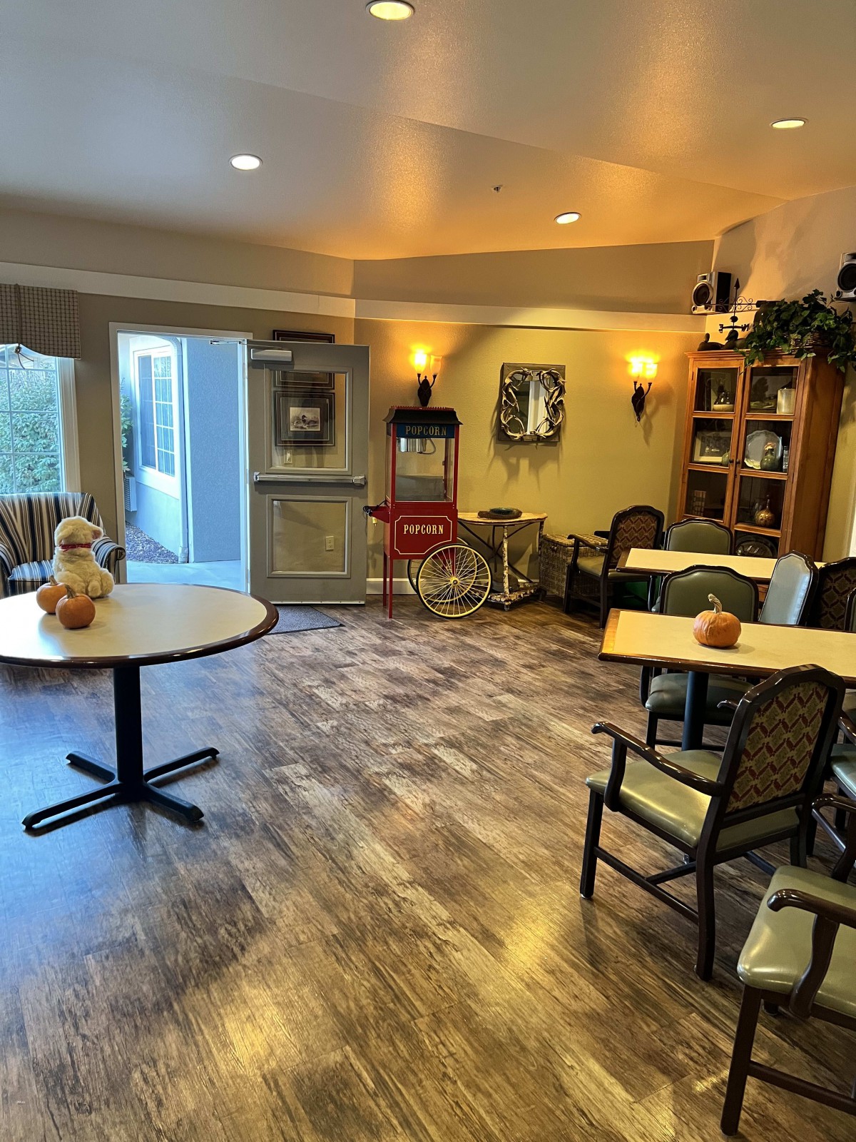 Cozy dining area with warm lighting and decorative elements.