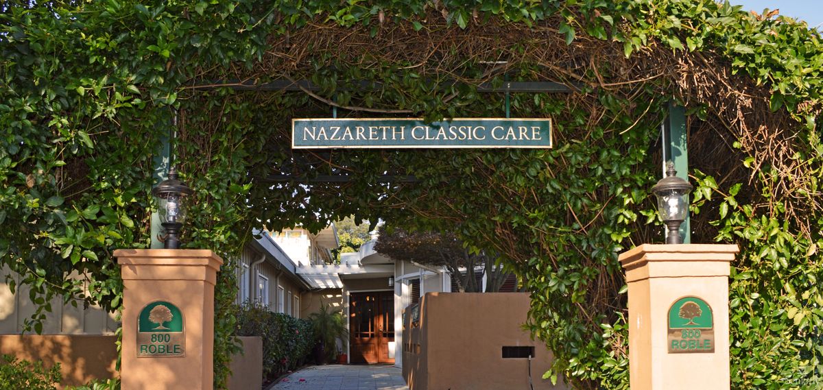 Entrance to Nazareth Classic Care covered by lush ivy.