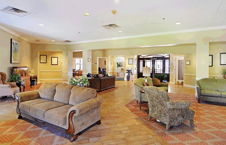 A cozy living room with comfortable sofas and elegant interior design.