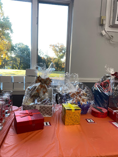 A beautifully arranged display of colorful gifts on a table, perfect for a festive celebration.