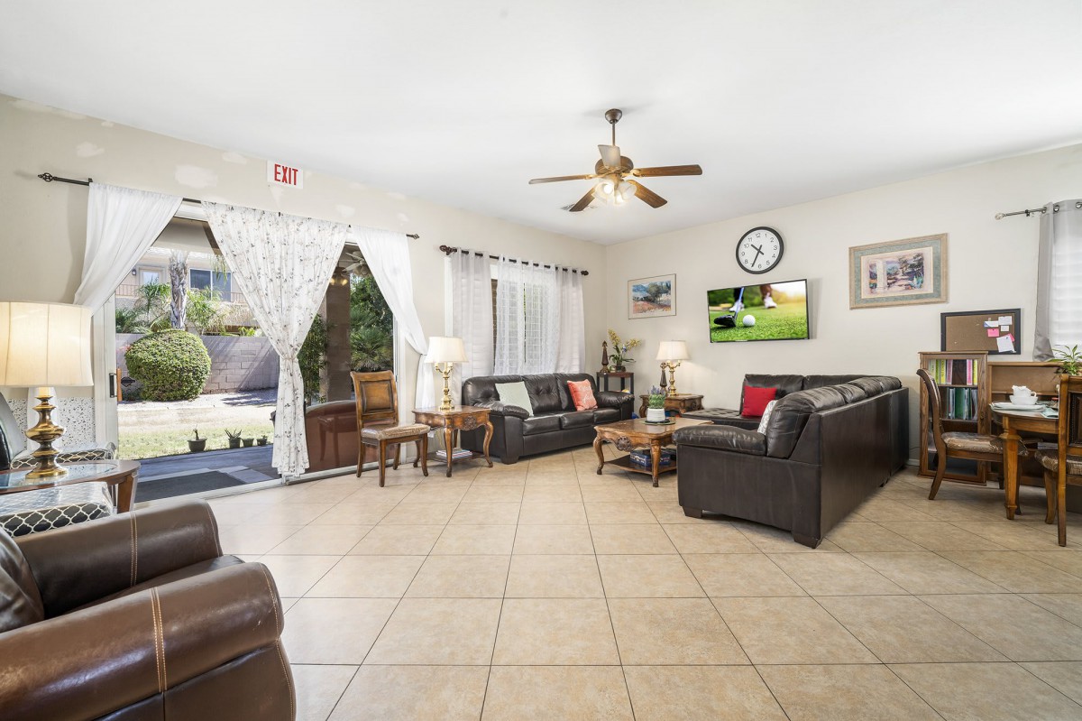 A spacious living room with comfortable seating and modern decor.