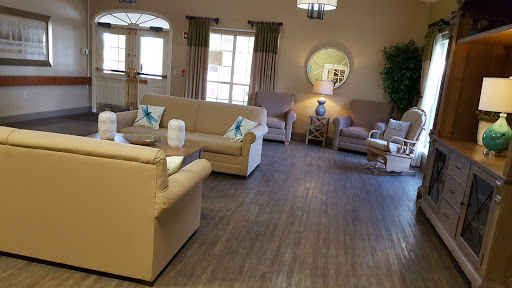 A cozy living room setup with comfortable sofas and a warm ambiance.